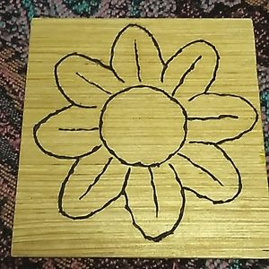 Wood burned flower